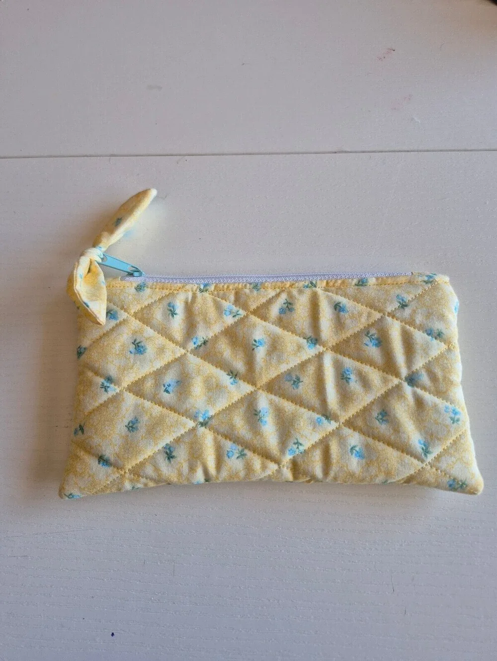 Quilted bow pouch